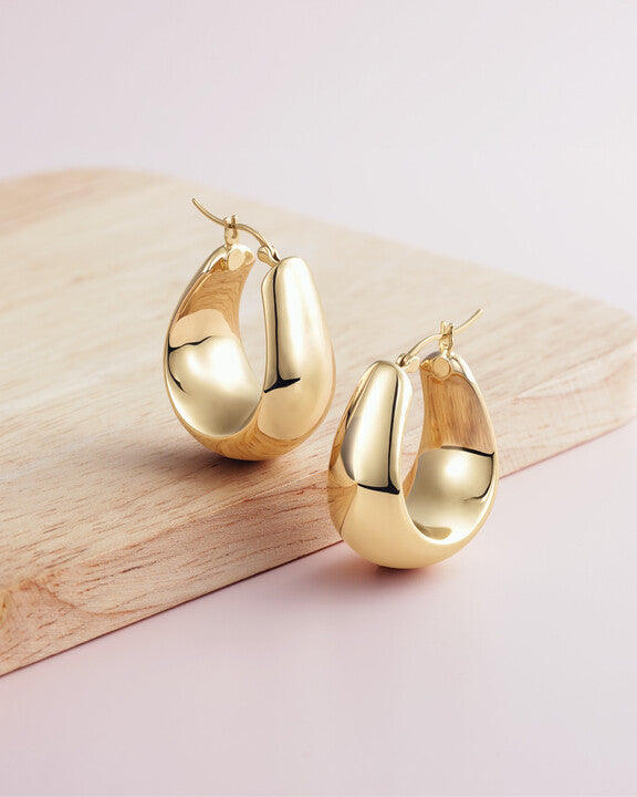 Diamond studs gold hoops sterling silver earrings women's fine jewelry Chapman's Jewelry Detroit