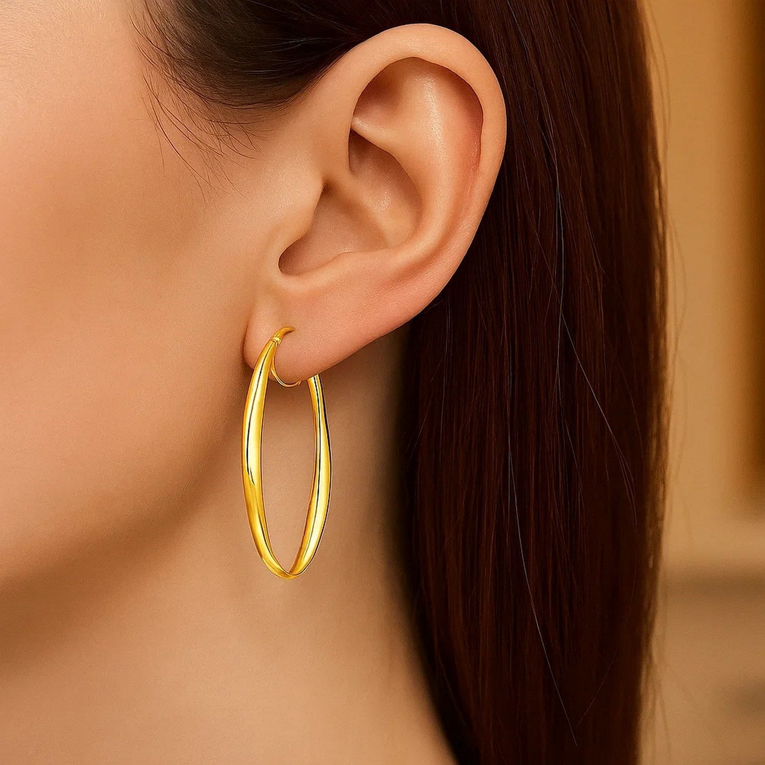 Twist Motif Oval Shape Hoop in 14K Yellow Gold