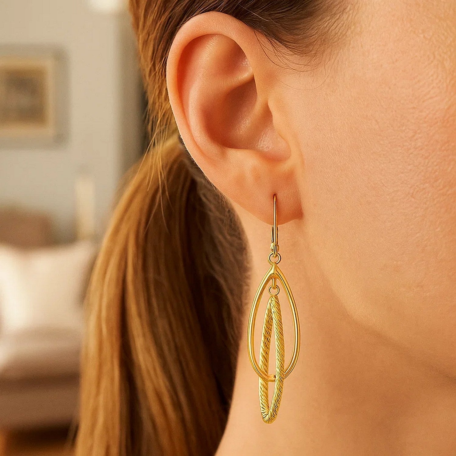 Shiny and Textured Teardrop Dangles in 14K Yellow Gold